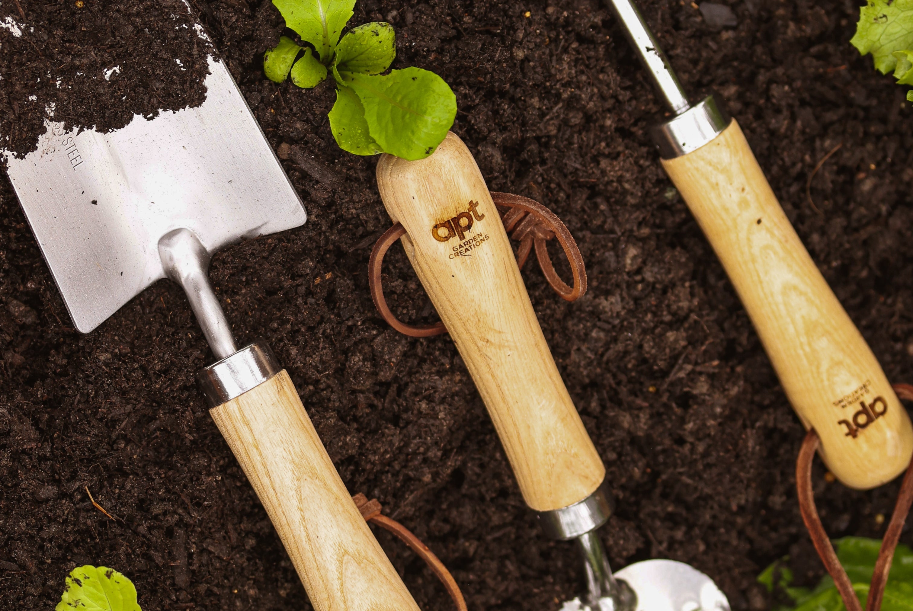 This stunning set of three garden tools, featuring ash-wood handles and stainless steel heads, a leather hang-strap and stylishly engraved with our Apt Garden Creations logo.