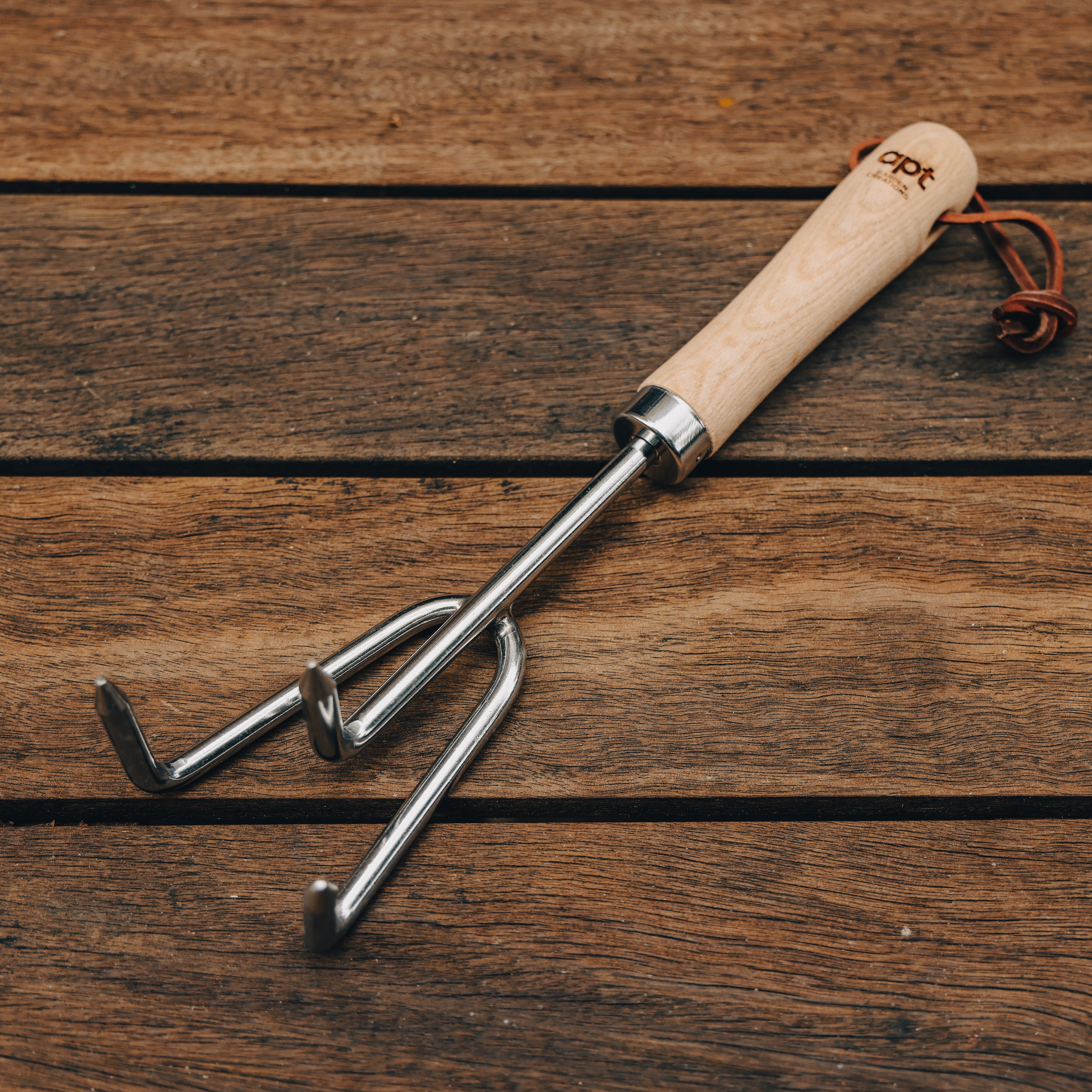 This stunning set of three garden tools, featuring ash-wood handles and stainless steel heads, a leather hang-strap and stylishly engraved with our Apt Garden Creations logo.
